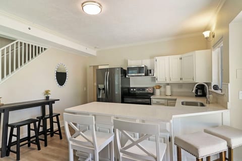 Kitchen and island seating.