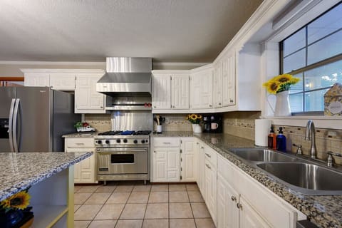 Cook in style with a sleek kitchen that combines modern elegance with functional design.