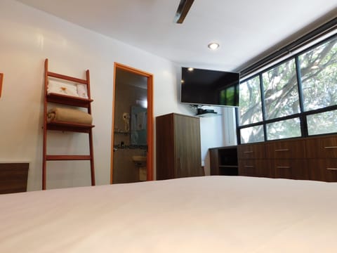 Deluxe Double Room, 1 King Bed, Non Smoking, City View | In-room safe, individually furnished, desk, laptop workspace