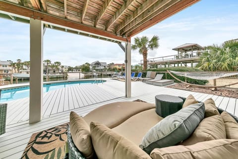 House, Multiple Beds, Canal View (Palm Breeze) | Pool | Outdoor pool