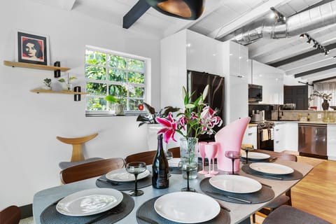 stunning dining room adorned by fine art