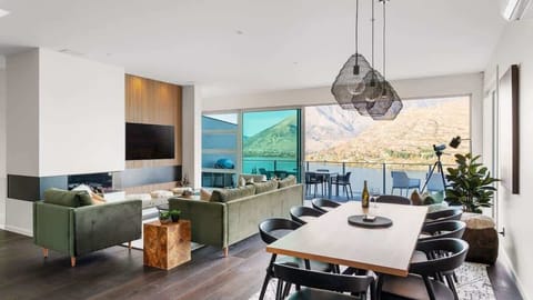 Dining Room with Indoor-Outdoor Flow
Step into the dining room, where indoor-outdoor living meets stunning views. The space flows seamlessly onto the patio, complete with a dining table perfect for al fresco meals.