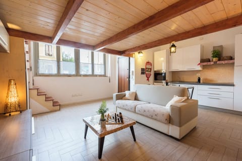 City Apartment | Living area | 40-inch flat-screen TV with digital channels