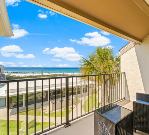 Relax on your private balcony watching the beach and ocean