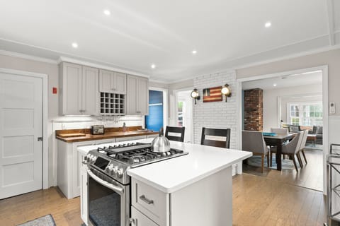 Stylish kitchen with ample space, easy cleanup with dishwasher.
