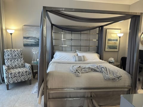 Enjoy the luxurious linens & down pillows on the comfy mattress of your King bed