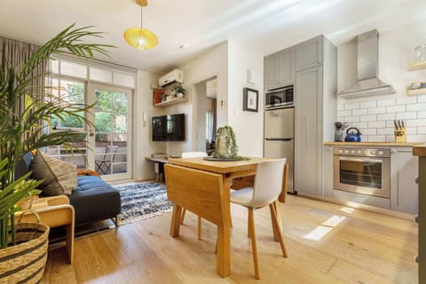Dining, Lounge, and Kitchen: Open-plan living with a modern kitchen, dining space, and lounge that flows out to the balcony
