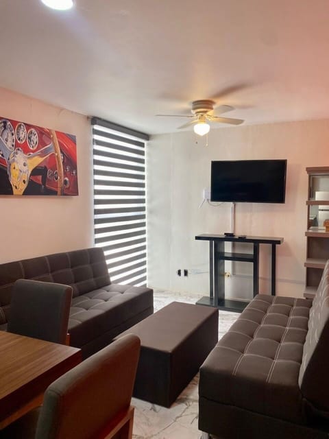 Apartment, Multiple Beds, Kitchenette, City View | Living area