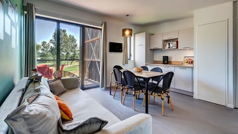 Sink into the cozy sofa after a day exploring the area.