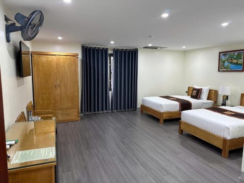 Twin Room | Minibar, blackout drapes, WiFi (free), bed sheets