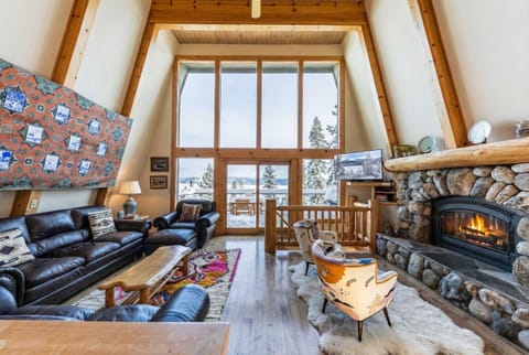 This 4-bedroom home is a cozy retreat that boasts stunning views of Lake Tahoe!