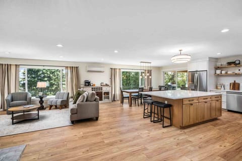 Picture windows throughout the open floorplan offer tons of natural light and vineyard views.