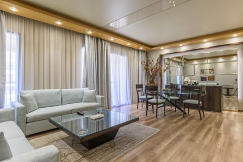 Family Suite, 2 Bedrooms, Smoking, Kitchenette | Living area | LCD TV