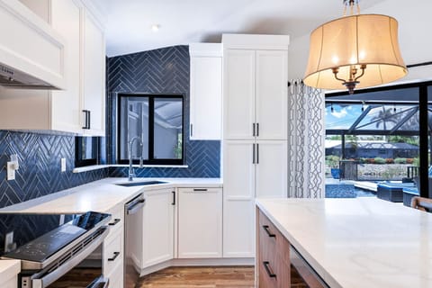 The Kitchen is Located on a Back Corner of the Home Giving It Scenic and Long Views Outdoors