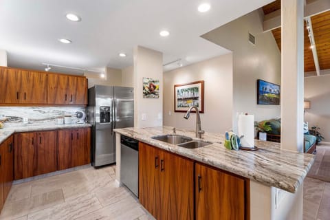 Enjoy the spacious kitchen with plenty of storage and a large island for meal prep.