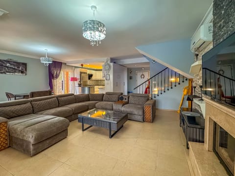 Luxury Villa | Living area | 40-inch LCD TV with satellite channels