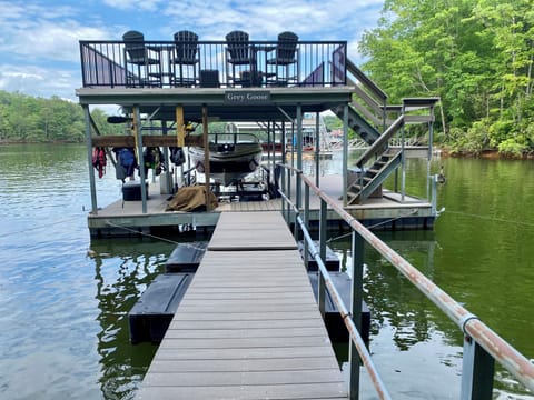 Updated dock in deep water with composite decking; kayaks(3) & paddle board incl