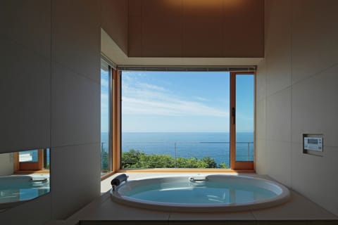 Basic Villa | Bathroom | Slippers, bidet