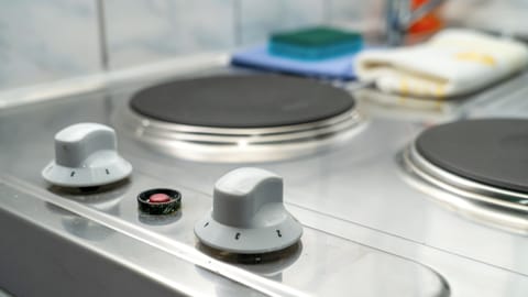 Mini-fridge, stovetop, electric kettle, toaster