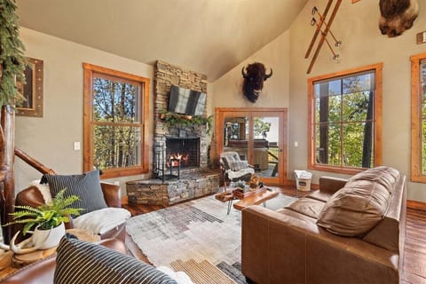 Main level family room with wood burning fireplace