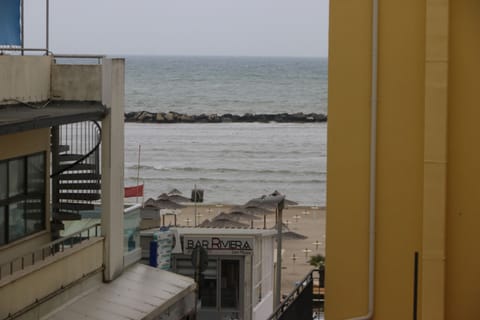 Basic Triple Room, Balcony, Beach View | Terrace/patio