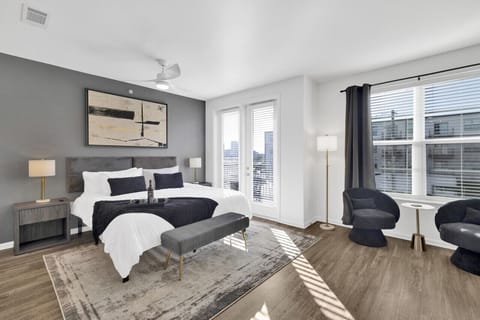 Bright and elegant bedroom designed for comfort and relaxation in this furnished apartment.