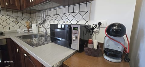 Family Condo | Shared kitchen facilities | Electric kettle