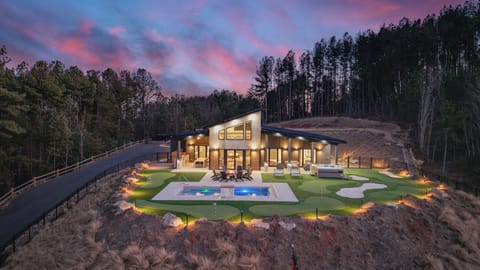 Welcome to Ridgeline - your dream vacation home with a heated pool, incredible mountain views, a putt-putt course, and a hot tub!