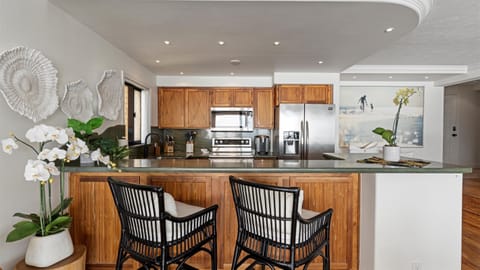 Kitchen with dining option at bar