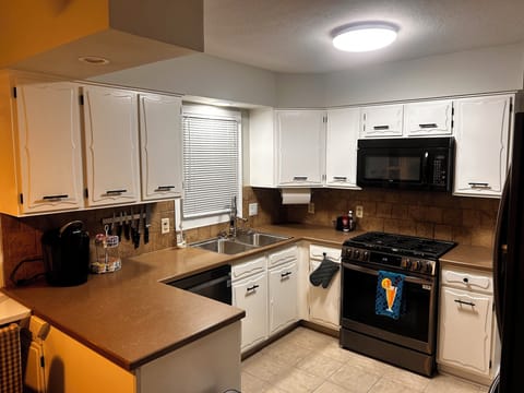 Full kitchen with bar seating