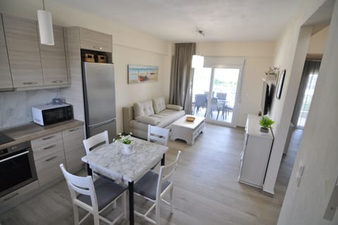 Family Apartment, 2 Bedrooms | Living area | Flat-screen TV