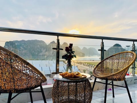 Panoramic Quadruple Room, Balcony, Bay View | Terrace/patio