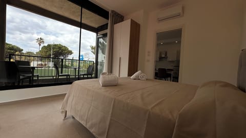 Deluxe Condo, 1 Queen Bed with Sofa bed, Garden View, Garden Area | 1 bedroom, desk, soundproofing, free WiFi