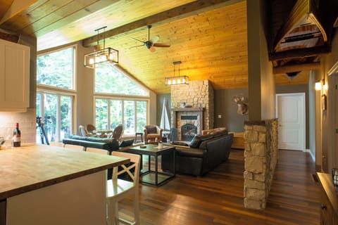 Stunning custom greenheart hardwood flooring throughout cottage.