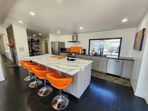 Large kitchen with stainless steel appliances