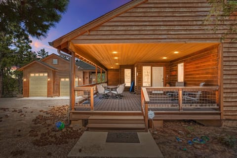 Our front steps to the cabin at dusk with a large front porch. 