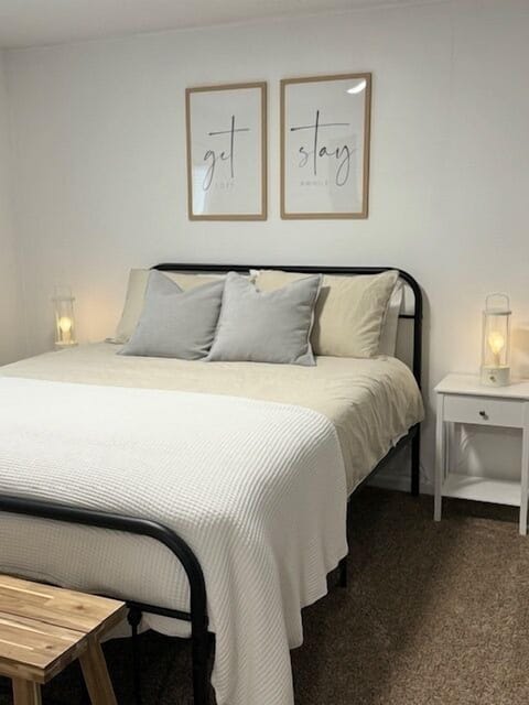 Cozy master bedroom with a walk in bathroom 