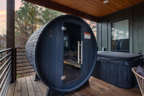 Sauna by the hot tub on the outdoor deck