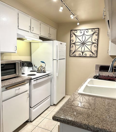 YOU WILL LOVE THIS KITCHEN AND ALL ITS AMENITIES, ITS EXQUISITE!