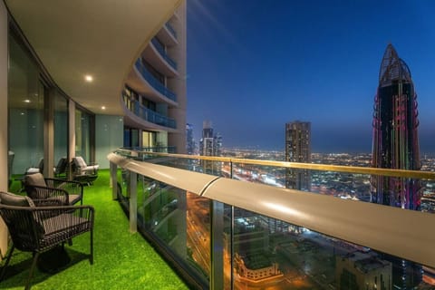 Balcony Bliss: Stunning skyline views await you from this chic outdoor retreat!