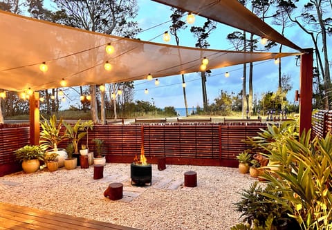 Front garden, ocean views. Enjoy the fire pit on cooler nights.