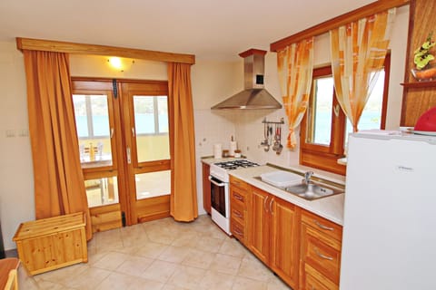 House (Holiday Home Katica - One Bedroom Hol) | Private kitchen | Fridge