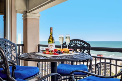 Sip champagne on your private balcony while soaking up breathtaking ocean views and gentle sea breezes.