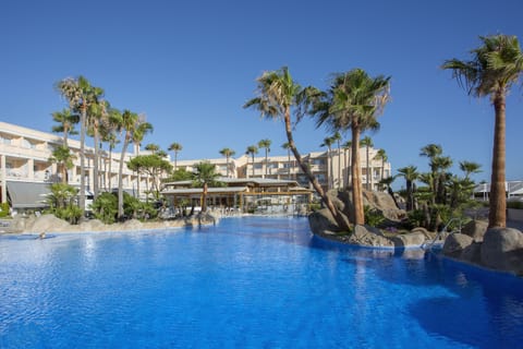 Indoor pool, outdoor pool, pool umbrellas, sun loungers