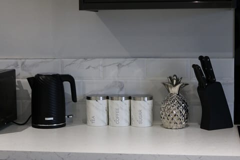 The apartment includes a modern kitchen/dining area, which is open plan and fully equipped with all of the utensils & crockery you need to cook during your stay.