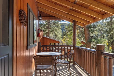 Enjoy a cup of coffee and some fresh mountain air on the porch.