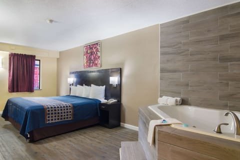 Suite, 1 King Bed, Smoking | Desk, blackout drapes, cribs/infant beds, rollaway beds