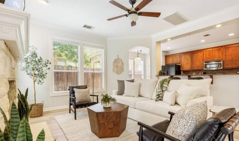 Spacious and bright living room with comfortable seating and sleeper sofa