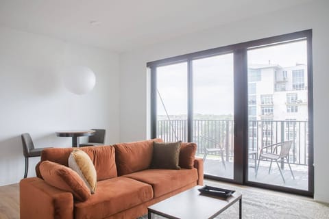 Unwind in a spacious living area that seamlessly blends comfort with modern design