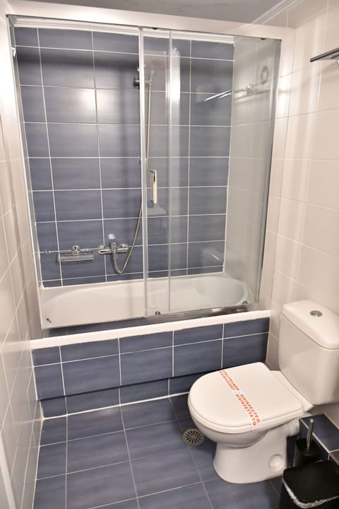 Suite, Balcony | Bathroom | Hair dryer, slippers, towels, soap